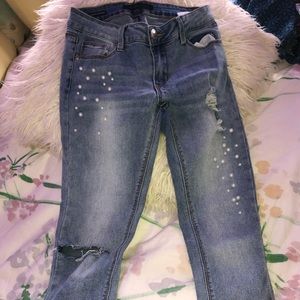 jeans with cute pearls on the side.